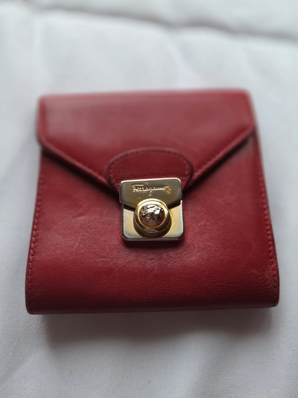 Red Leather Salvatore Ferragamo Wallet Featuring a Gold Gancini Clasp